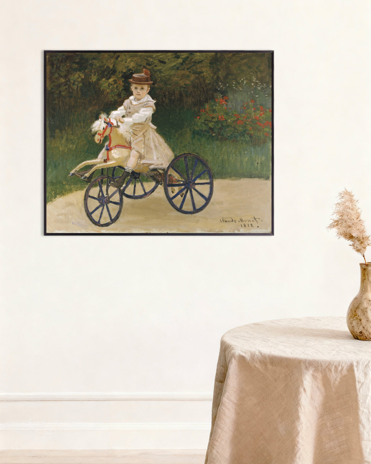Claude Monet’n Jean Monet keppihevosellaan (1872) -juliste metallikehyksessä