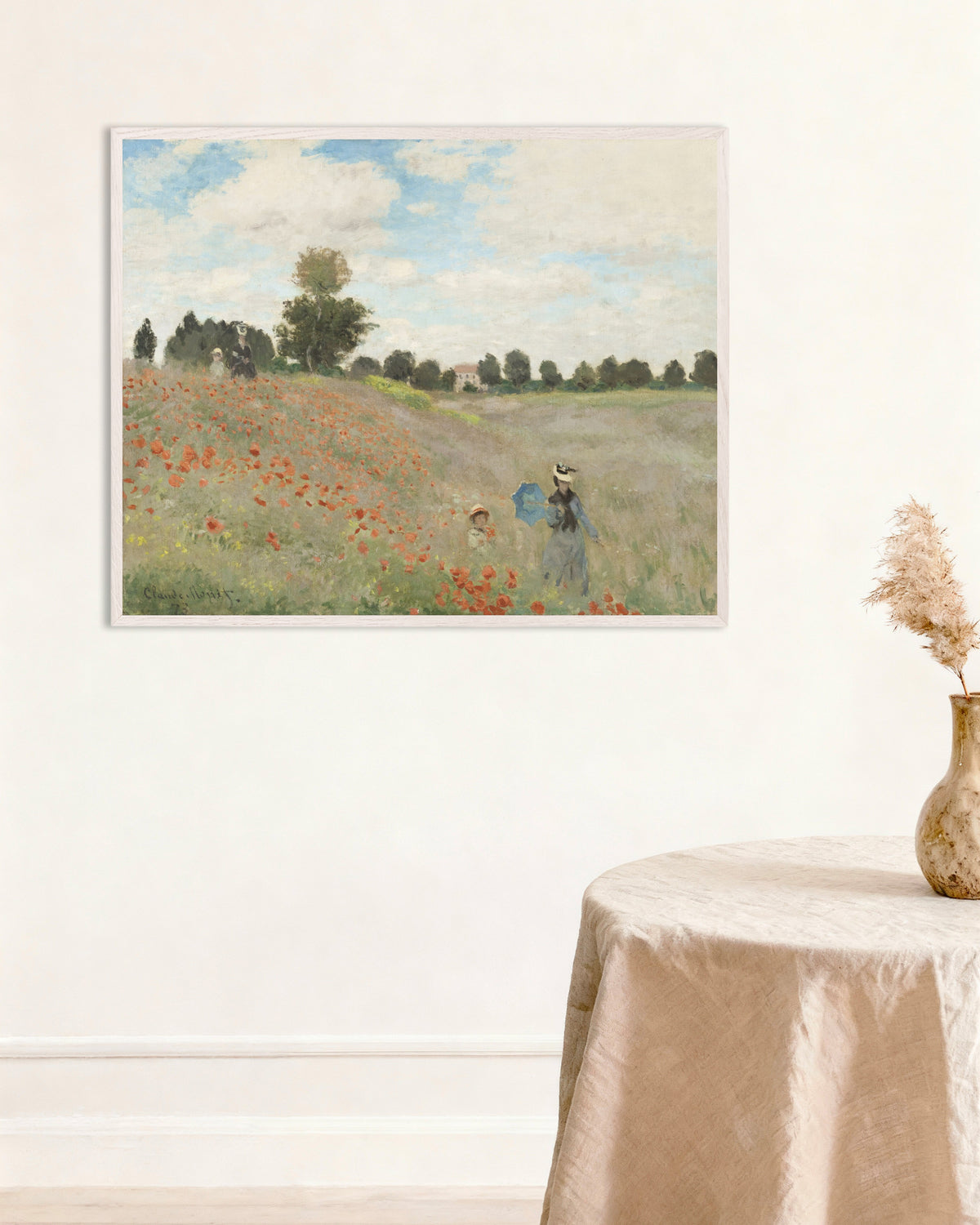 Claude Monet’n Unikot (1873) -juliste valkoisessa puukehyksessä