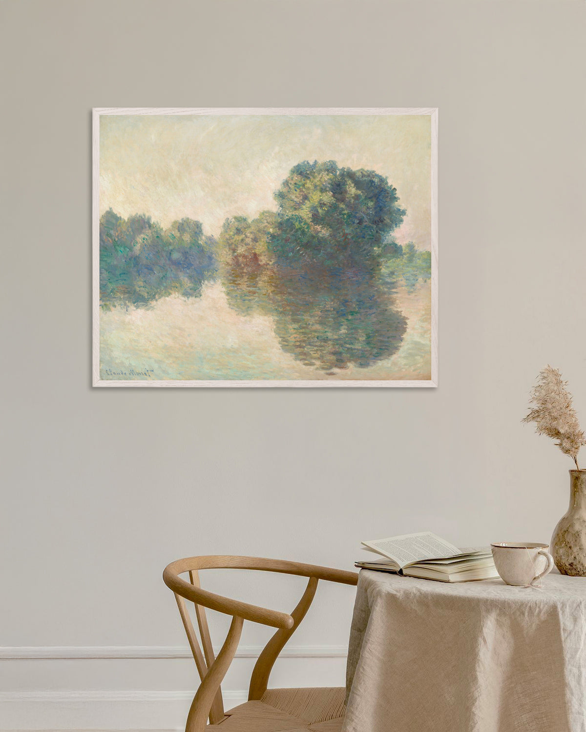 Claude Monet’n Seine Givernyssä (1897) -juliste valkoisessa puukehyksessä